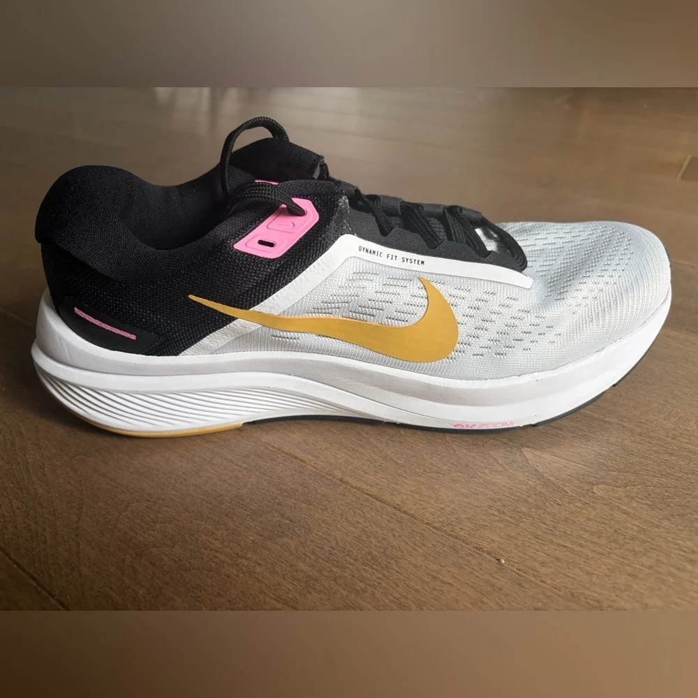 Nike Women’s White Running Sneakers with Black, Pink & Gold Accents